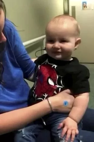 A Christmas Miracle: Nine-Month-Old Baby Hears Parents for the First Time