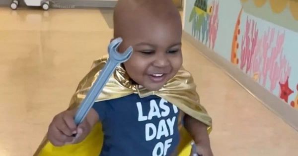 'Superhero' two-year-old celebrates end of chemo - following brave cancer battle