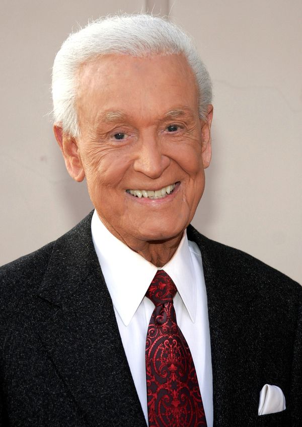 Bob Barker with a parrot