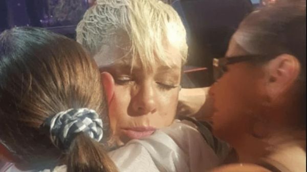 Pink with her daughter on stage