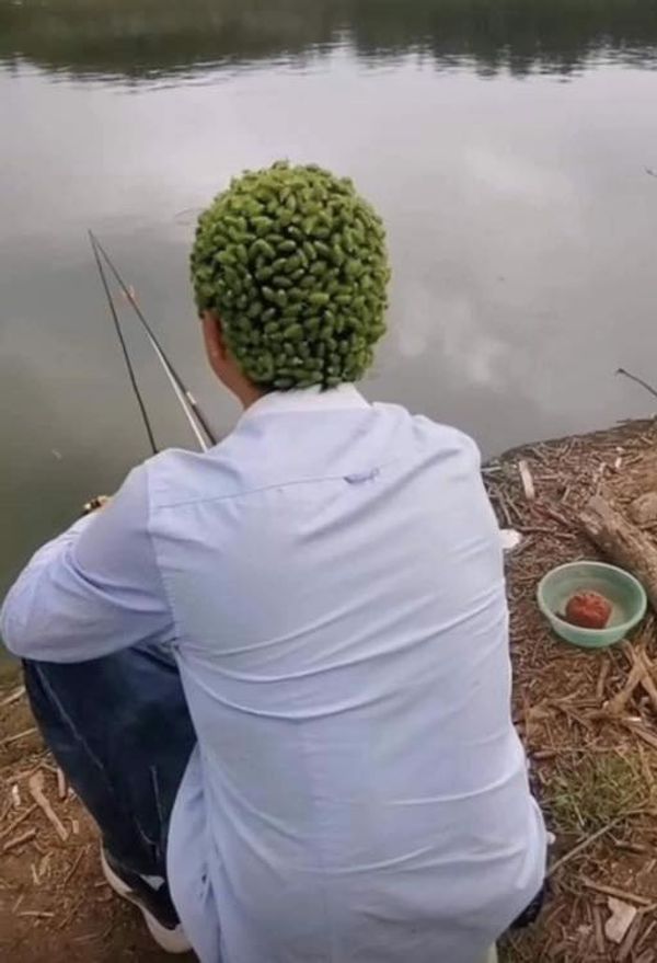 Father with objects on his head