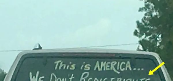 Shocking Message on the Back of an SUV Goes Viral