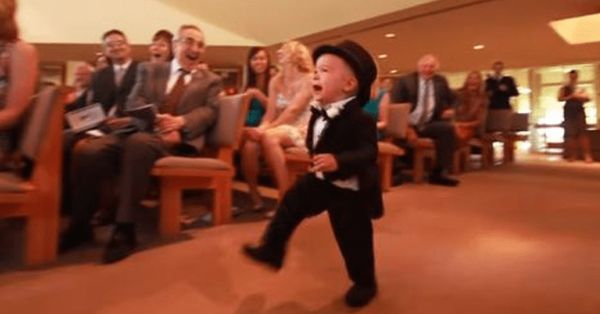 Cute Ring Bearer’s Entrance Brings Laughter to Wedding Guests