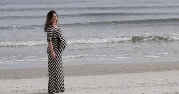 When a Dolphin Photobombs a Maternity Shoot