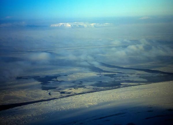 A wintry aerial shot of both Big and Little Diomede. (P.A. Lawrence, LLC./Alamy Stock Photo)