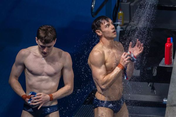 Olympic divers must take a shower after taking the leap. (Tim Clayton/Corbis via Getty Images)