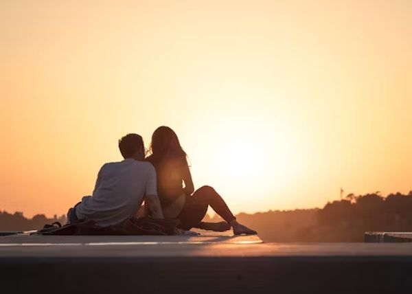 A couple watching the sunset