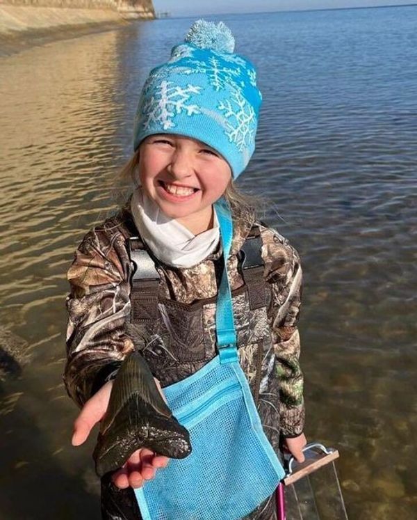 Molly Sampson Discovers a Rare Megalodon Tooth on the Beach