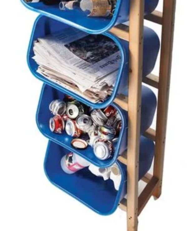 Recycling bins stacked on top of each other.