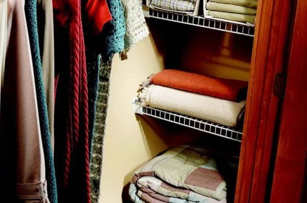 Close up of a closet with shelves.